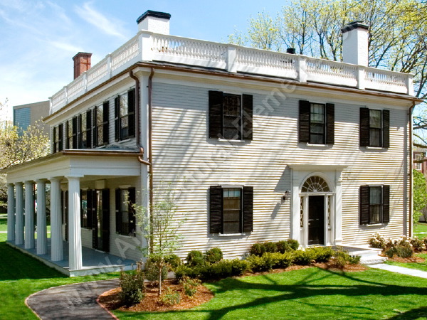 Custom railing system with decorative balusters and sturdy handrail.