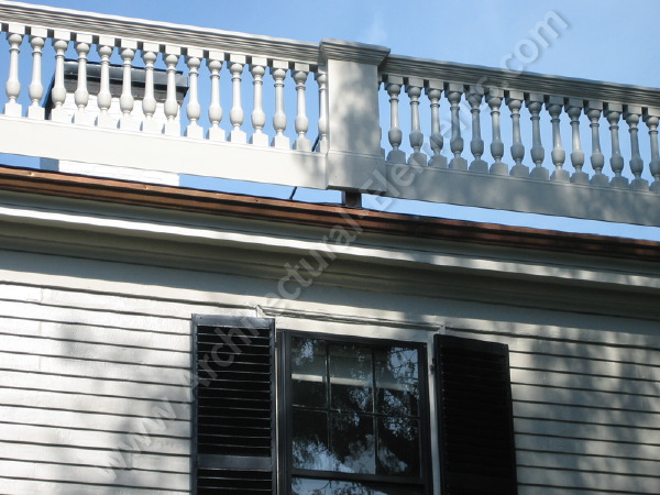 Custom railing system with decorative balusters for architectural elegance.