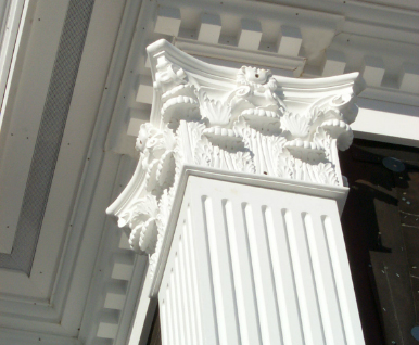Architectural pillar with intricate mouldings and decorative trim